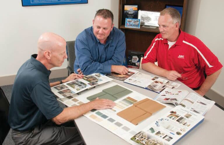 Customer Reviewing Sample Boards During a Consultation