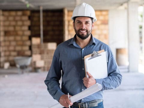 Construction Worker with Hard Hat and Clip Board, Holding Blue Prints